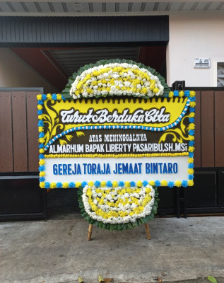 Papan Bunga Duka di Koto Baru